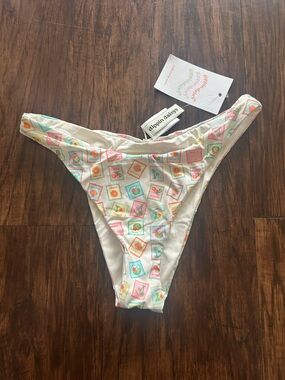 Dippin' Daisy's Cream Bikini Bottoms with Pastel Stamp Print